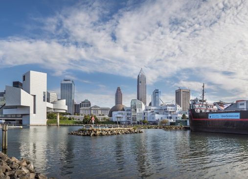 View of Cleveland skyline from lake erie shows rock hall and science center